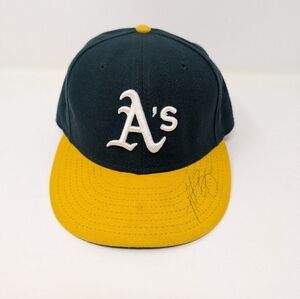 NWT. Authentic 59Fifty baseball cap OAKLAND As. Looks like it's been signed.
